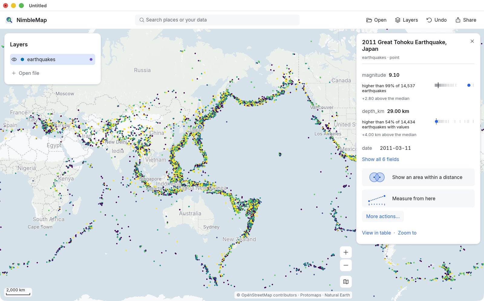 NimbleMap showing 14,537 big earthquakes since 1900 as points coloured by magnitude around the Pacific; the 2011 Tohoku earthquake is selected and its card says its magnitude of 9.1 is higher than 99% of them.