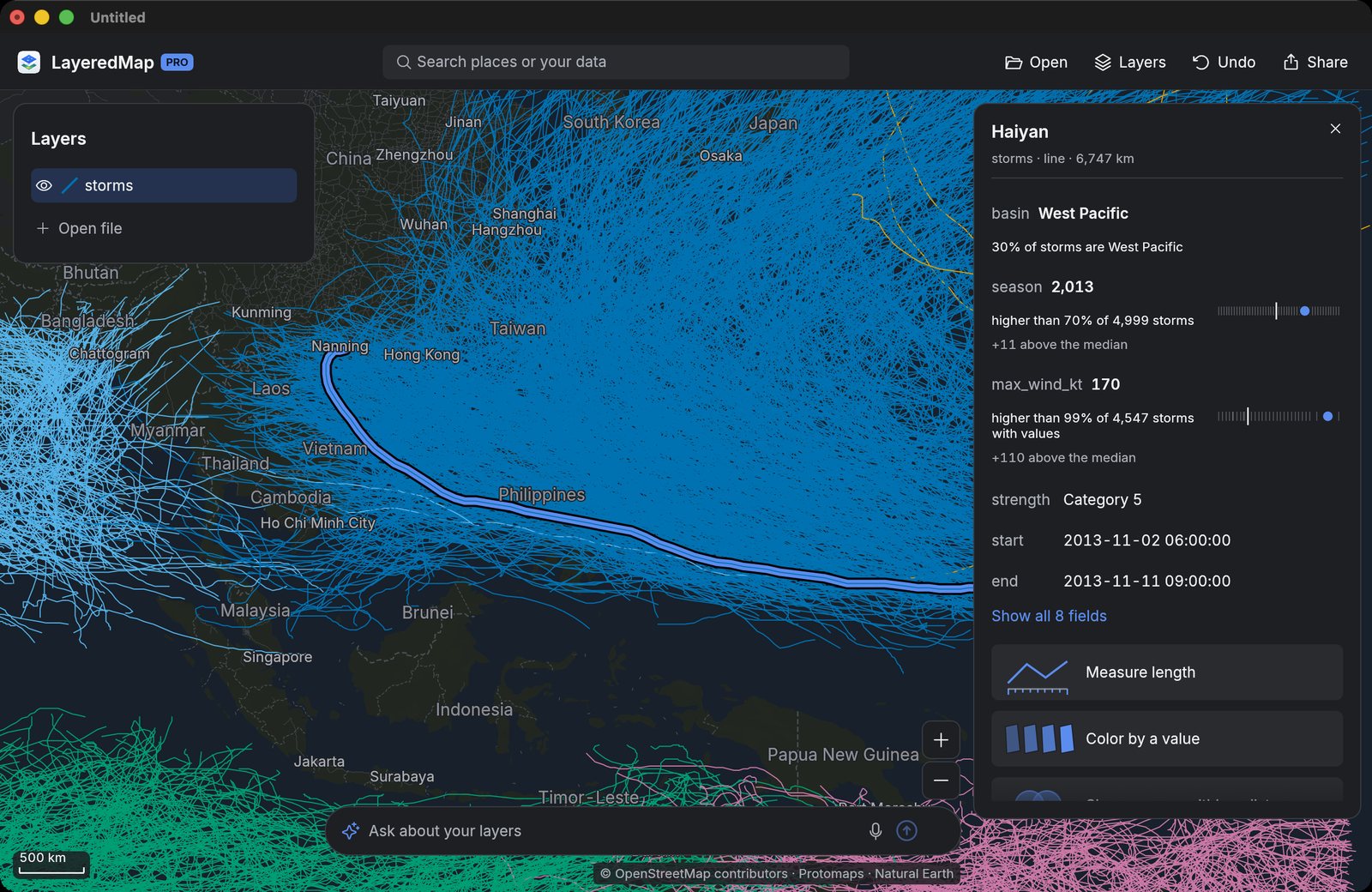 The same Haiyan card in NimbleMap Pro, with Measure length and Show an area within a distance buttons, and the Ask about your layers box at the bottom of the map.